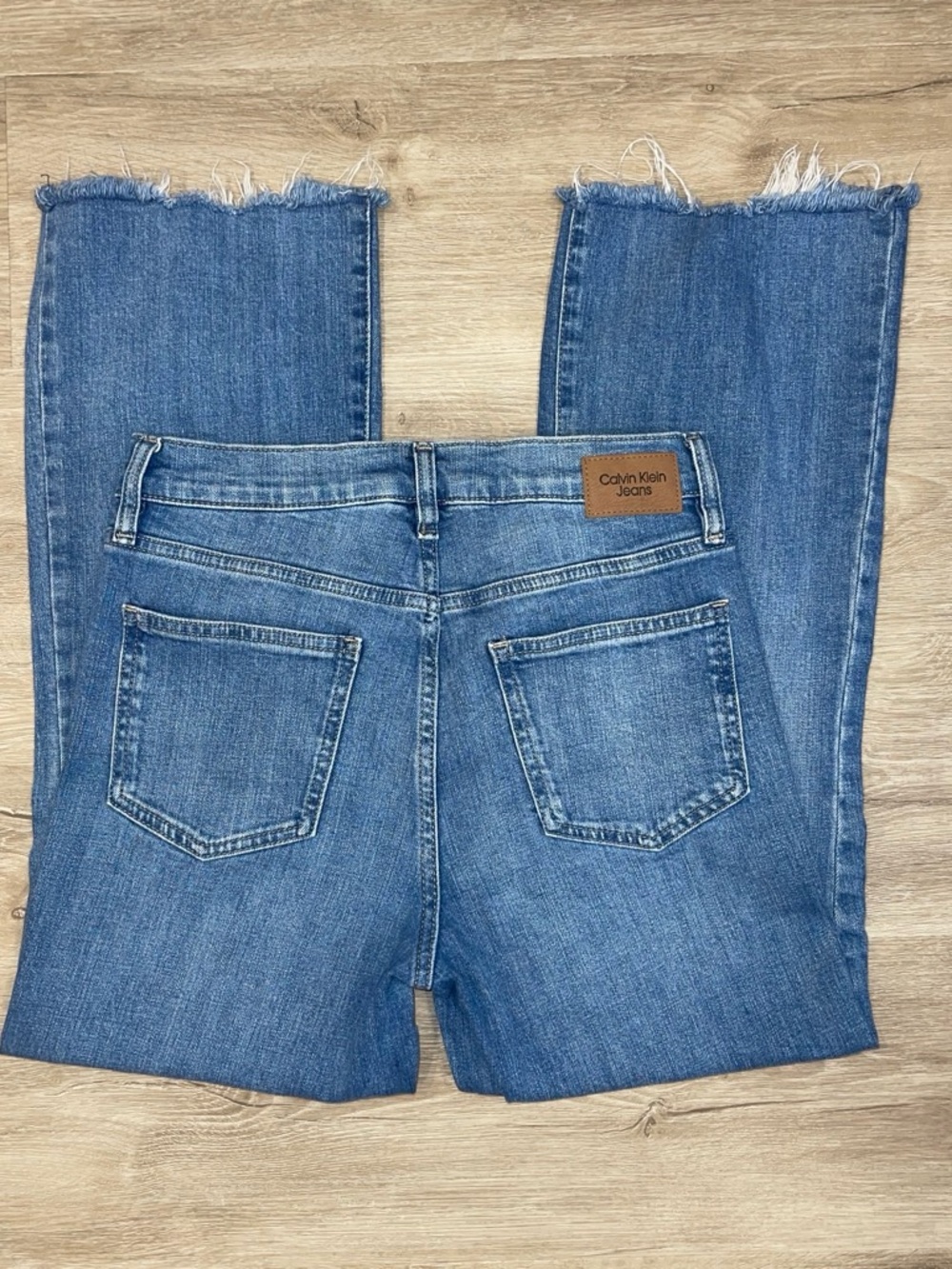 Calvin Klein women Jeans Medium Blue High-Rise Cropped Raw Hem size 28